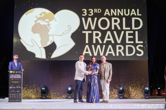 Accepting the award on stage at the 33rd Annual World Travel Awards